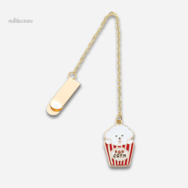Pendentif métallique sur un marque-page fonctionnel