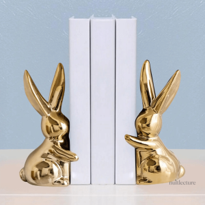 Serre-livre design en céramique avec lapins dorés