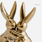 Accessoire design pour livres avec lapins dorés en céramique