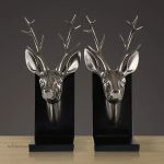 Accessoire de bibliothèque en cuivre à motif de cerf