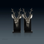 Serre-livre en cuivre au design animalier, têtes de cerf