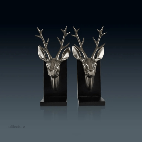 Serre-livre en cuivre au design animalier, têtes de cerf