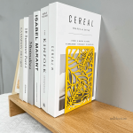 Serre-livre en métal avec design de feuilles de Basho