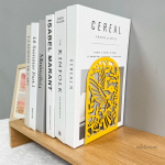 Accessoire de bureau : serre-livre en métal coloré