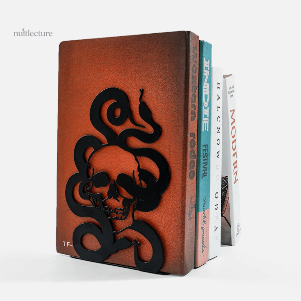 Support à livres métallique serpent et squelette
