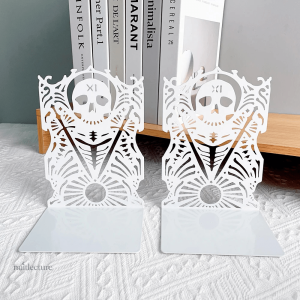Serre-livre original en métal avec design crâne